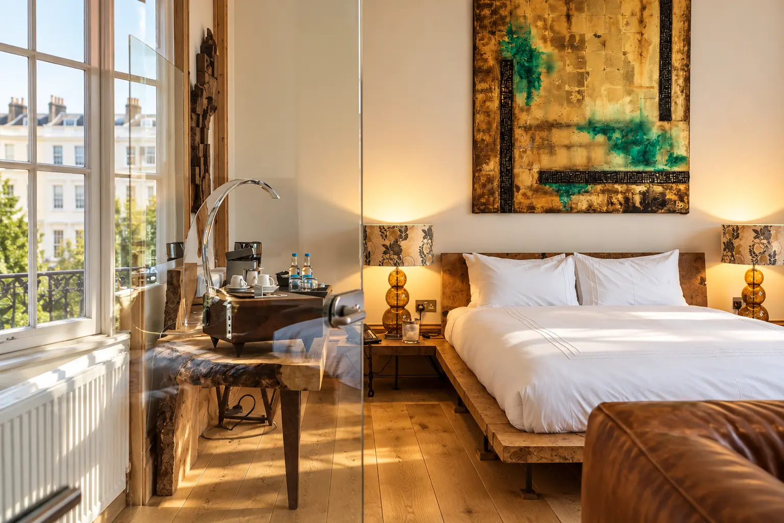 AI interior illustration based on Hotel Una Brighton’s official room photograph: sash windows, a clear glass bath partition, chrome freestanding tap, rustic timber bed, amber lamps and gold-and-teal artwork. Not an actual photograph of the premises or guests.